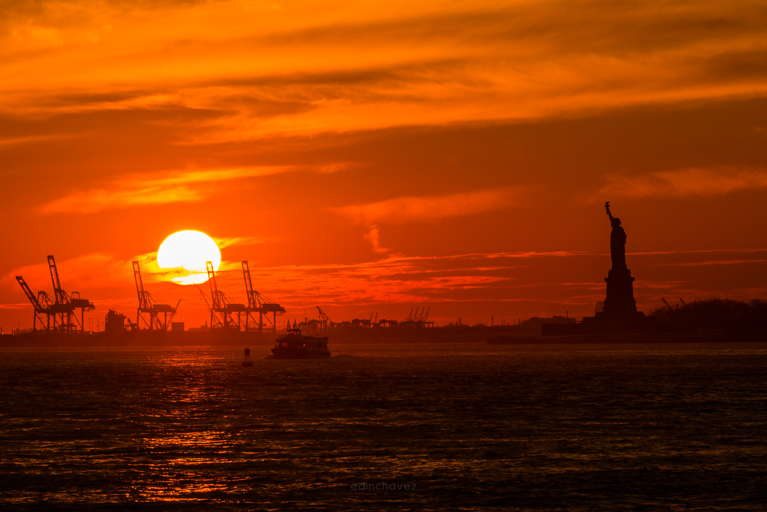 Photo of statue of liberty at sunset